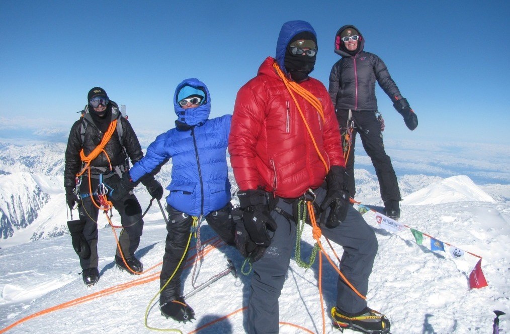 hikers putting on hiking gear