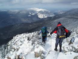 hikers walking on snow